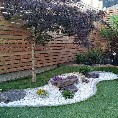 Contemporary horizontal slatted privacy fence